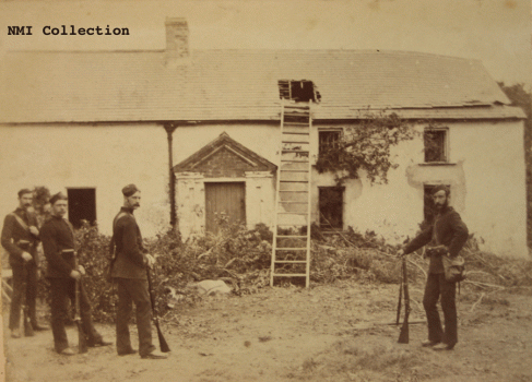 RIC constables at an evicted family's cottage, Coolgreany, Co. Wexford (NMI Collection)