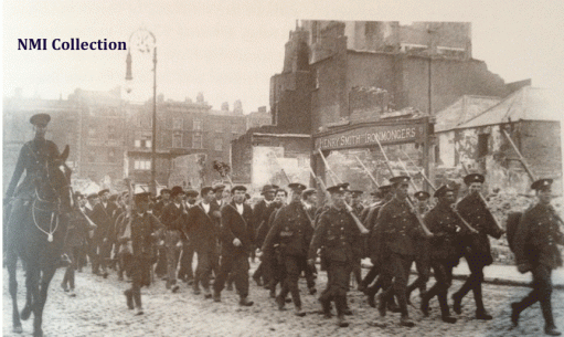 Irish prisoners being marched under guard down Eden Quay for deportation to England (NMI Collection)