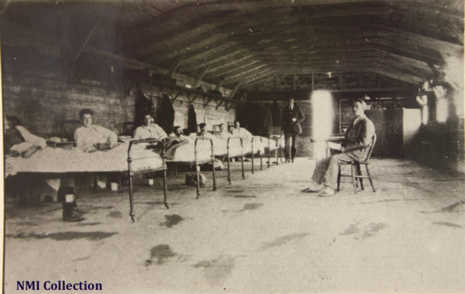 Prisoners in the hospital hut at Rath Internment Camp (NMI Collection) 